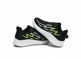 Black running shoes with green accents