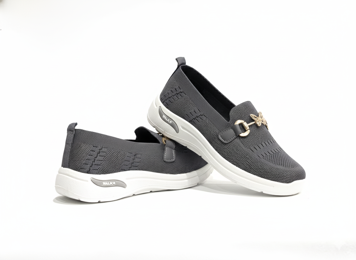 Pair of Grey loafers with gold accents