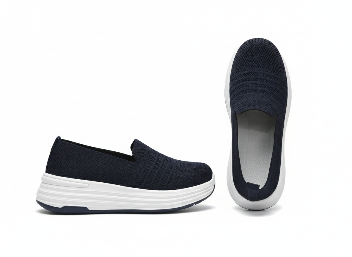 Black slip-on shoes with white sole