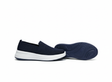 Blue slip-on shoes with white sole