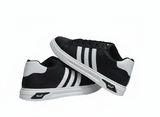 Black sneakers with visible white stripes