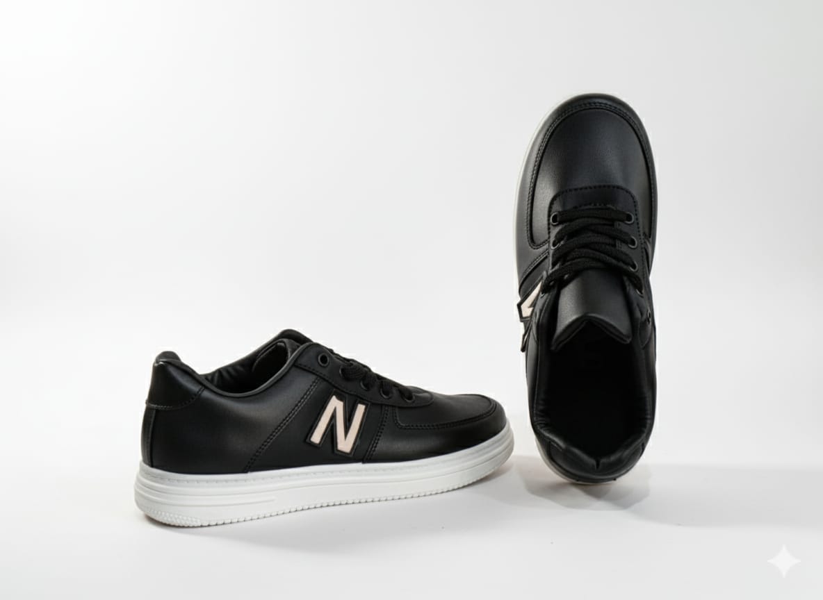 Black sneakers with a text "N"
