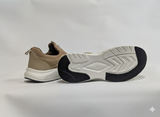 Pair of Khaki shoes with white soles