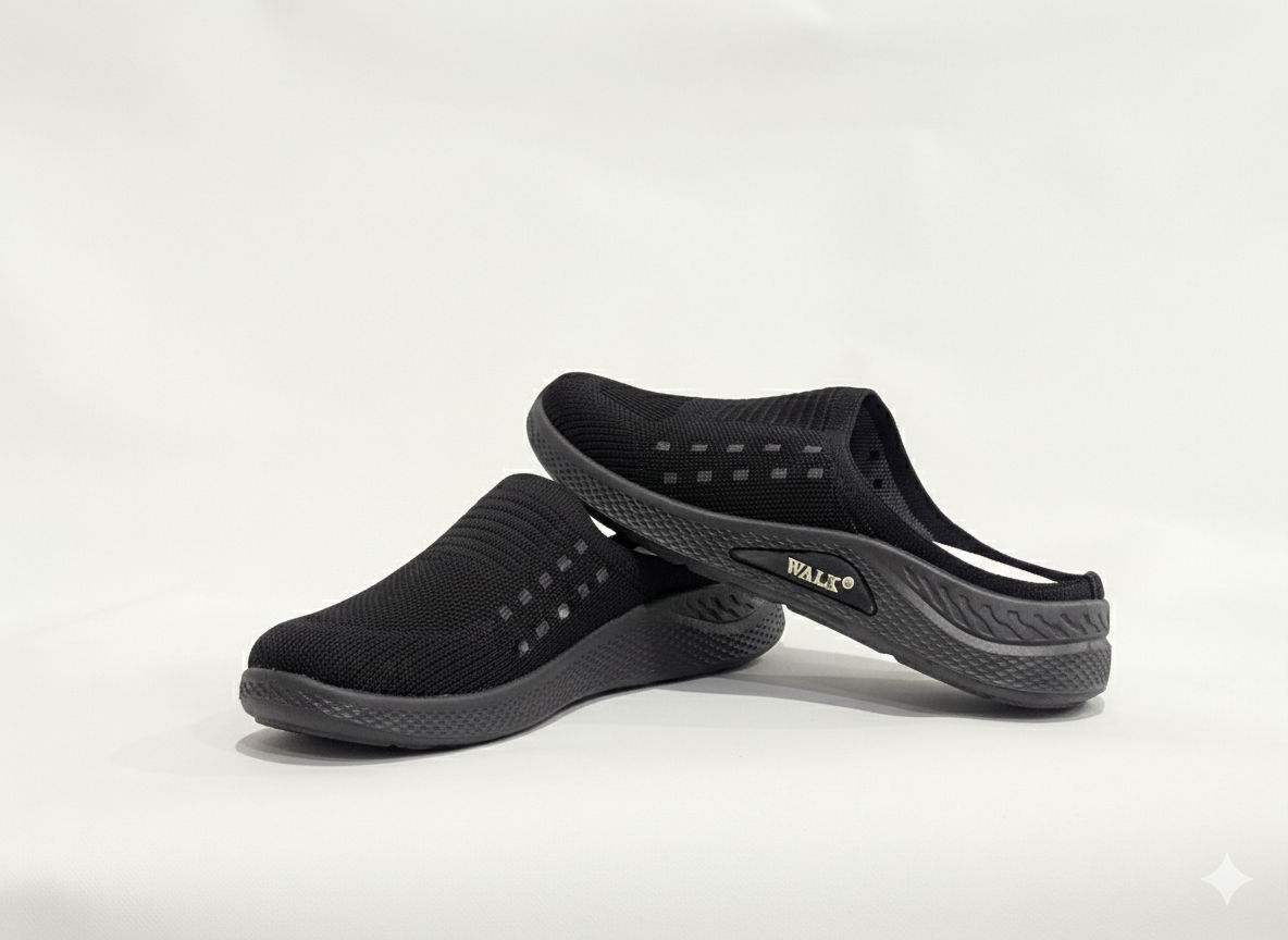 Black slip-on shoes with white soles