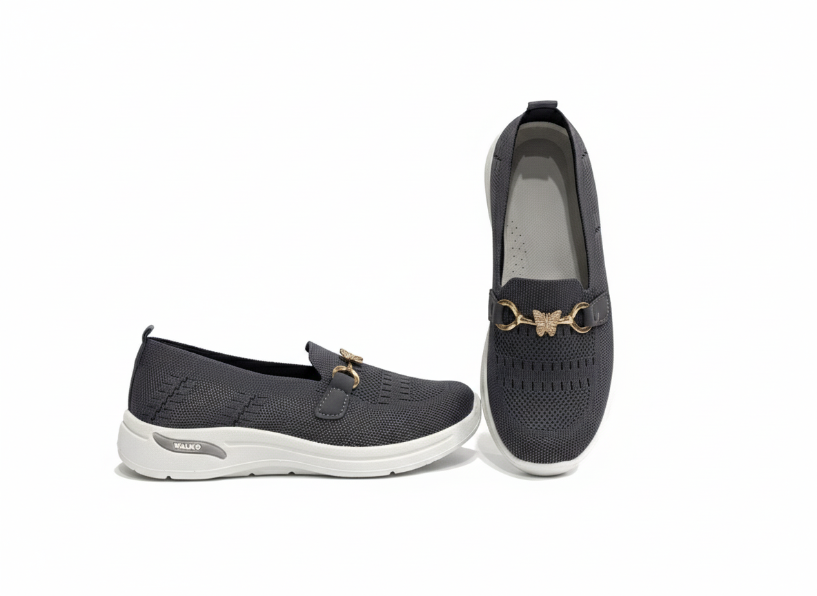 Pair of Grey loafers with gold accents 