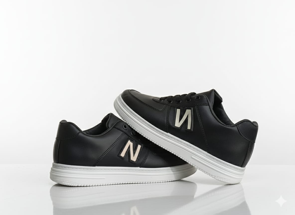 Black sneakers with a text "N"
