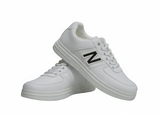 White sneakers with a text "N"