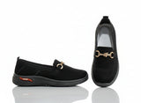 Pair of black loafers with gold accents 