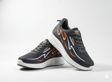 Grey running shoes with orange accents